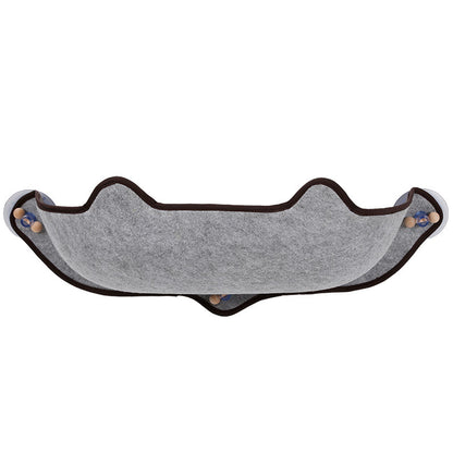 Grey window cat hammock with dark trim and four suction cups
