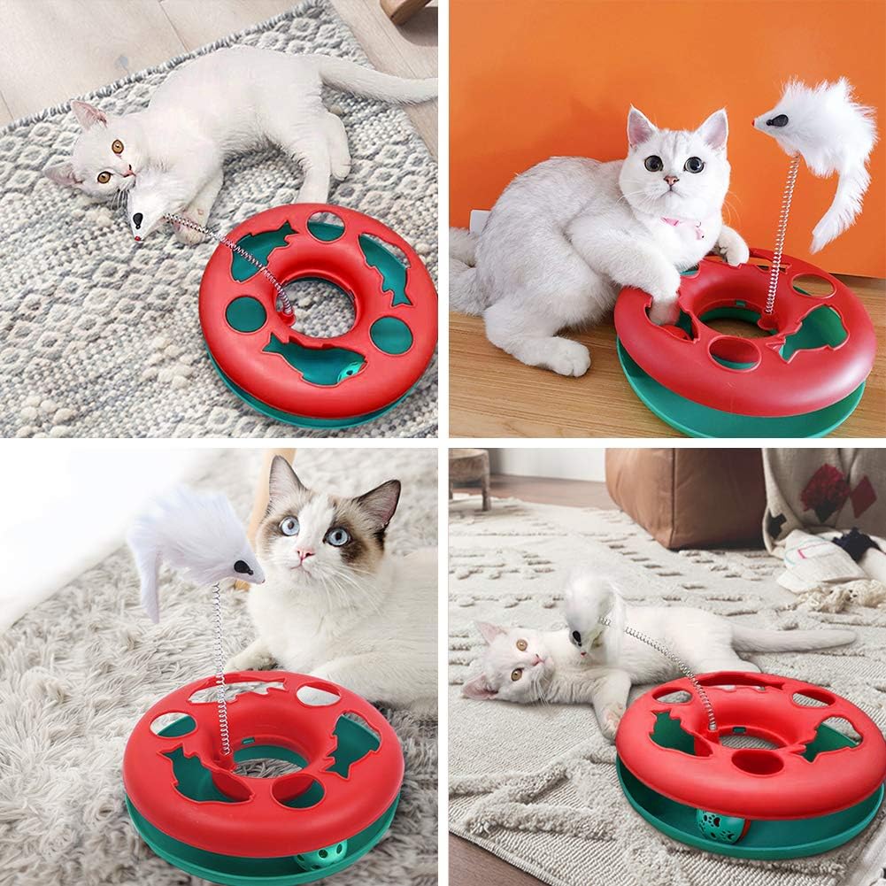 Red-and-teal interactive cat toy with white mouse on spring, with cats on bedding