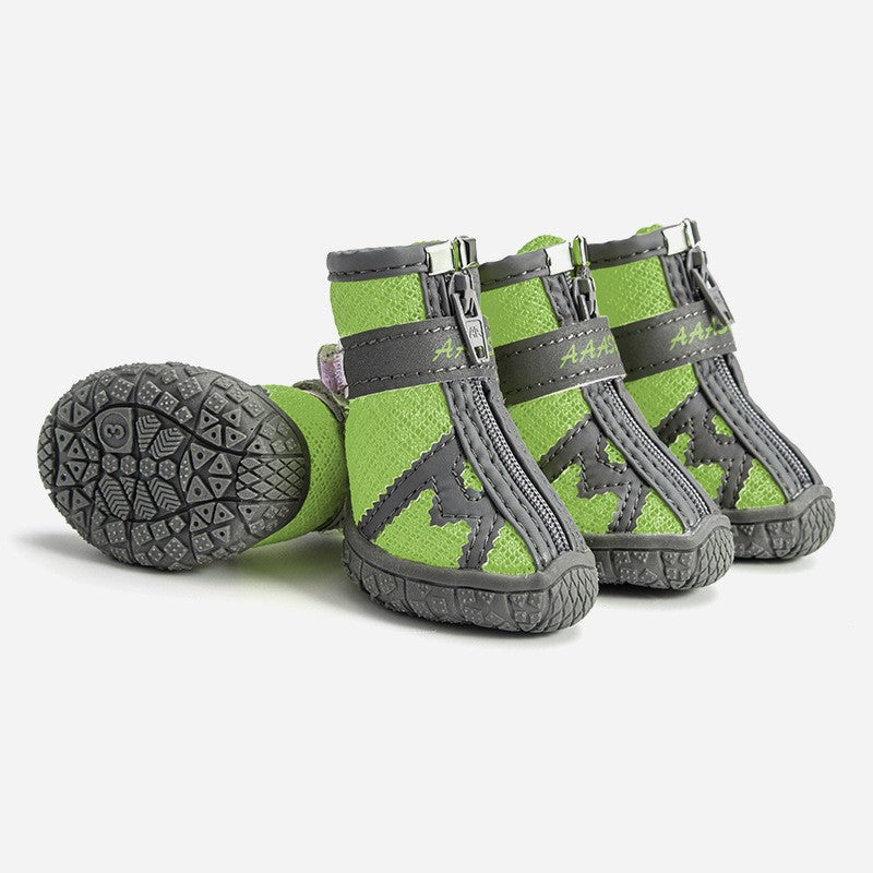 Waterproof pet rain boots, lime green with gray straps and rugged rubber sole.