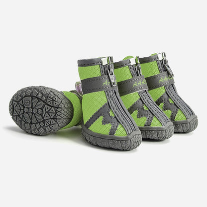 Waterproof pet rain boots, lime green with gray straps and rugged rubber sole.
