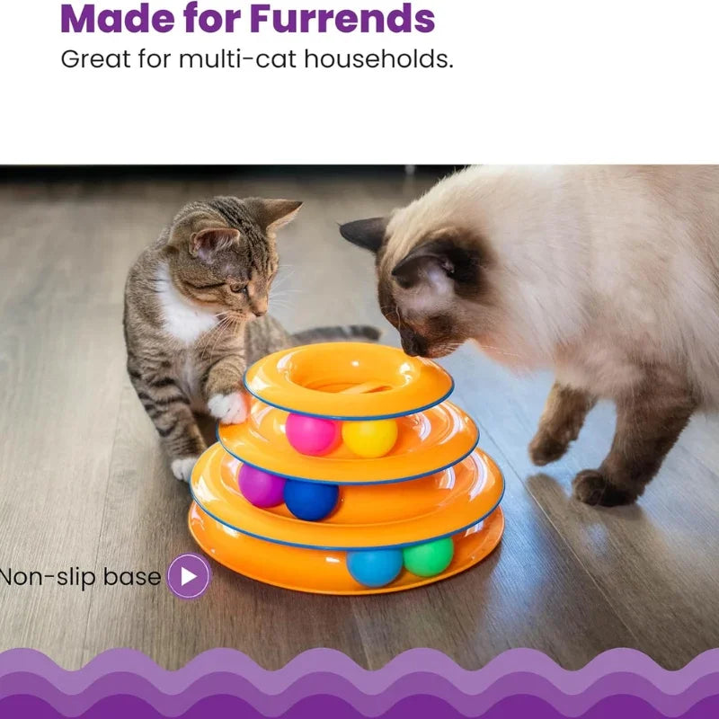 Two cats playing with a WTN Essentials 3-tier interactive spinning ball track toy.