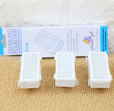 Three white replacement filter pieces for pet water dispenser, pack of filters
