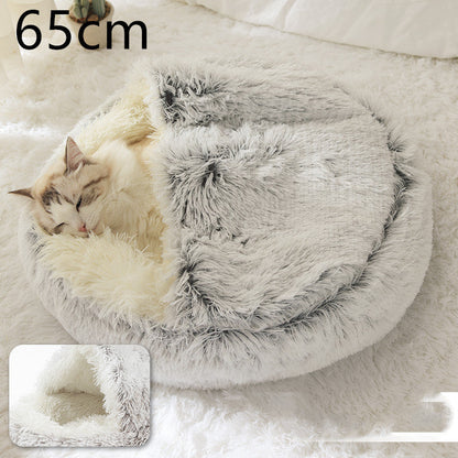 Grey shag plush oval pet bed with cat resting inside, cushioned walls