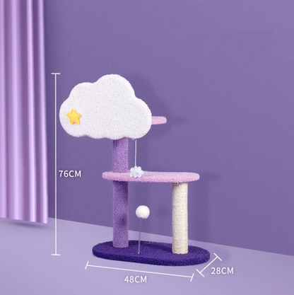 Cat scratching platform with purple posts, cream base, and cloud-shaped top perch with dangling ball