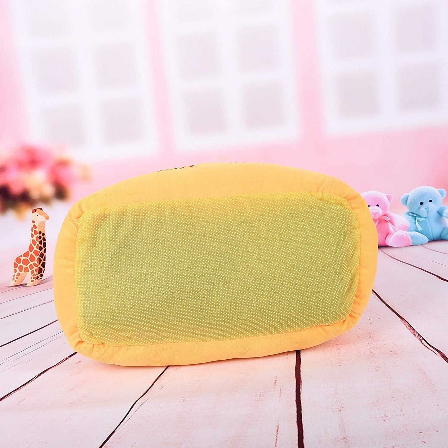 Hot dog-shaped pet bed, orange plush back panel with rounded, padded edges.