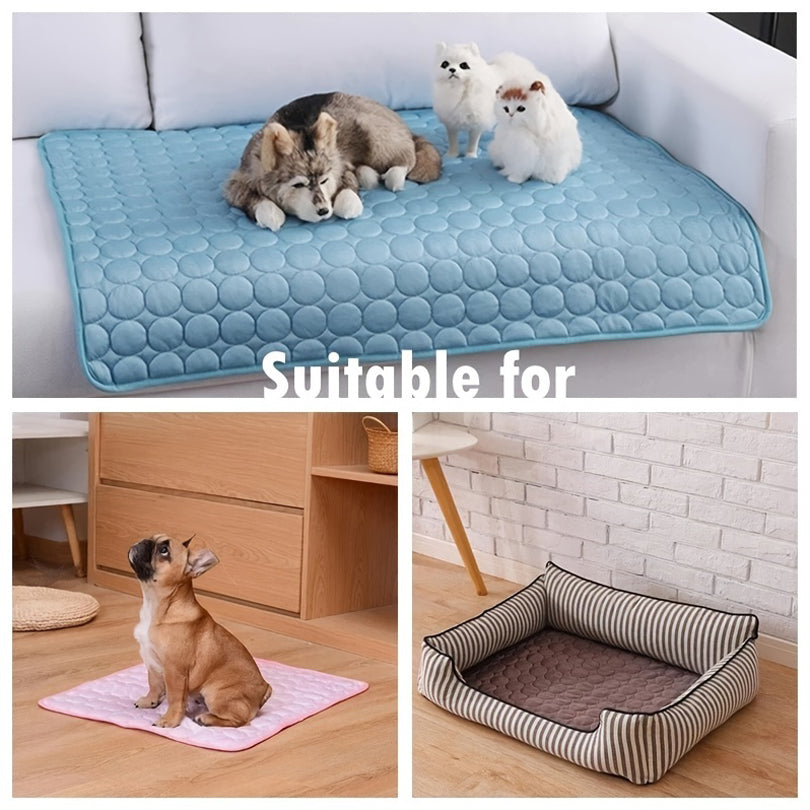 Blue cooling mat for dogs with raised bubble pattern, rectangular bed