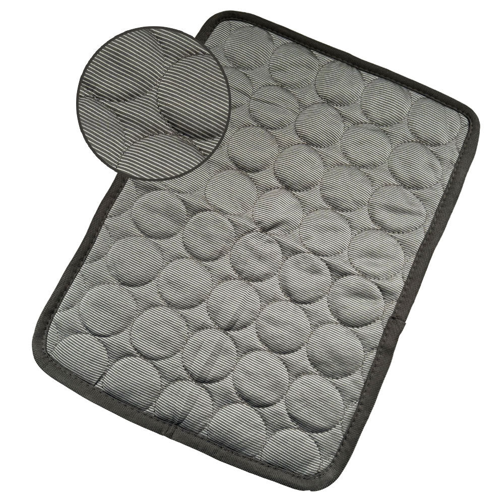 Dark gray cooling pet mat with textured honeycomb surface and black edge trim