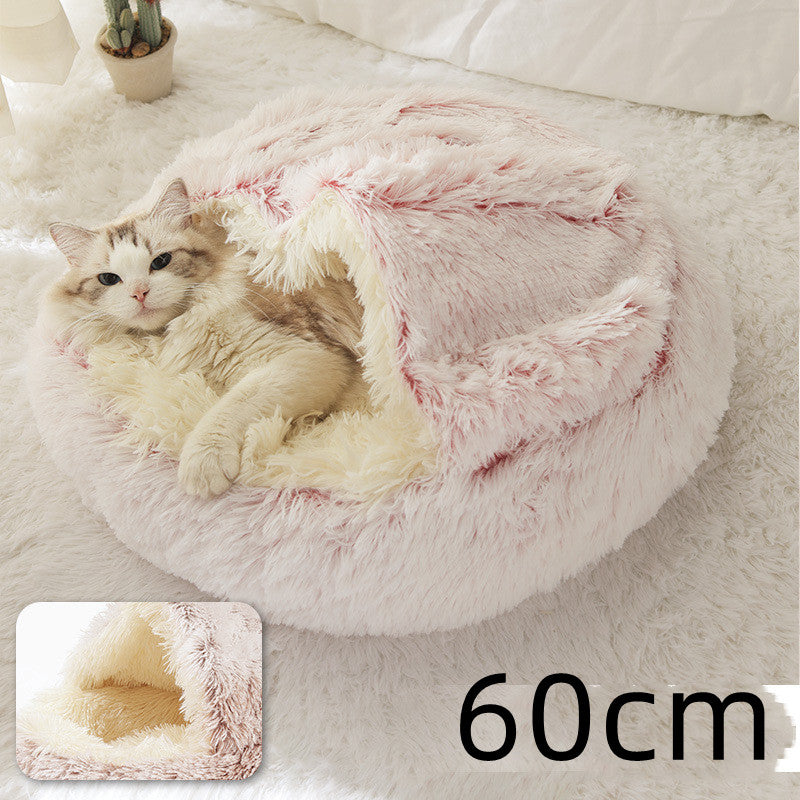 Pink plush round pet bed with curled sleeping area, 60 cm