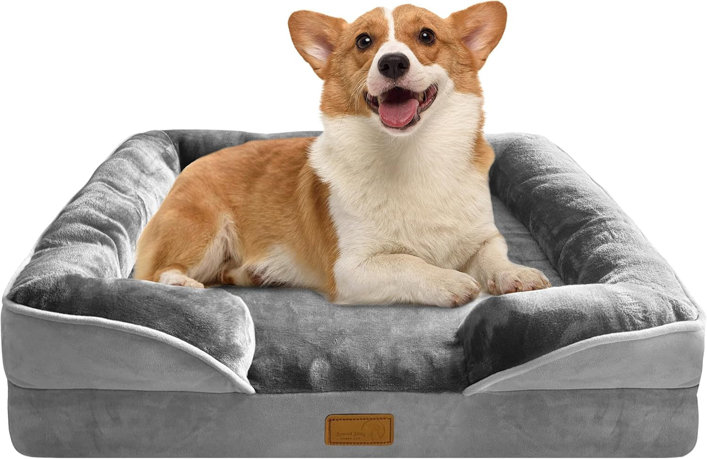 Corgi lying on a gray orthopedic dog bed with padded bolster pillows