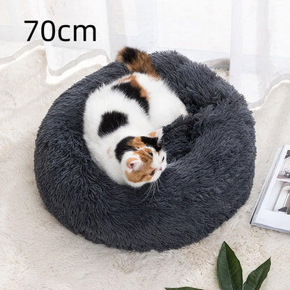 70 cm round pet bed, dark gray plush with a small cat sleeping inside.