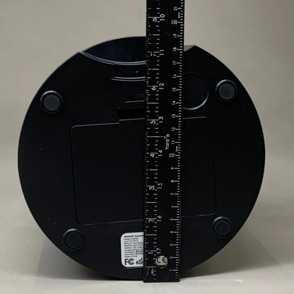 Black automatic cat feeder base with measuring tape across