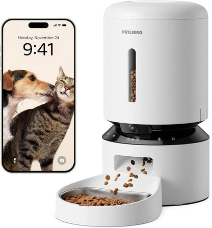 White automatic pet feeder with camera window, app phone display, and feeding bowl