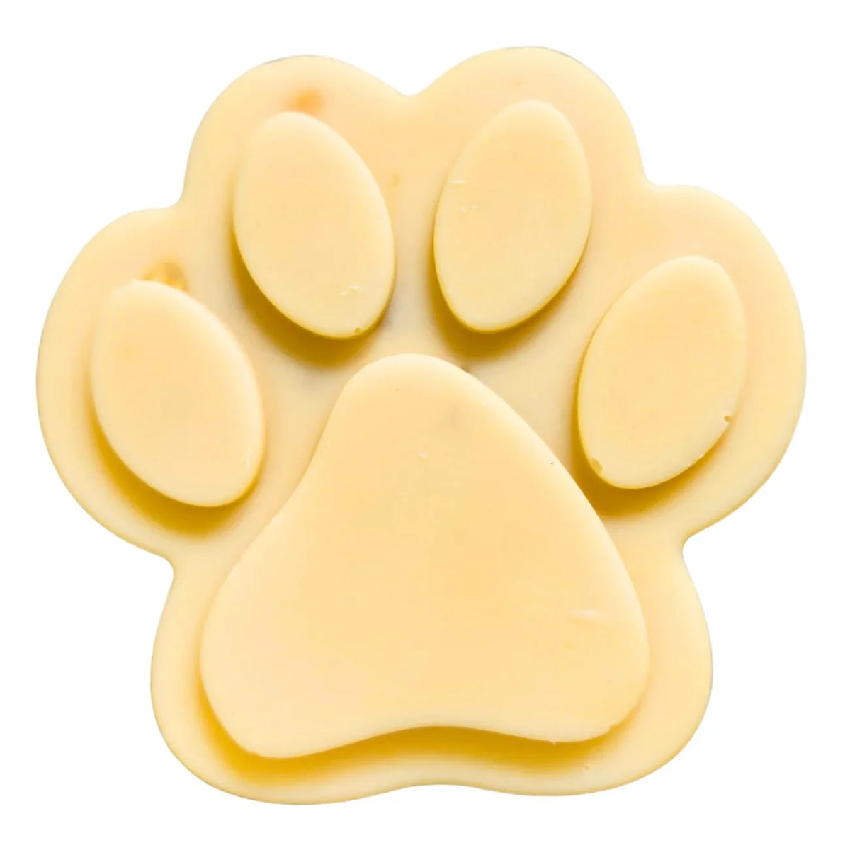 Paw-shaped goat milk soap bar, pale yellow, oval slices