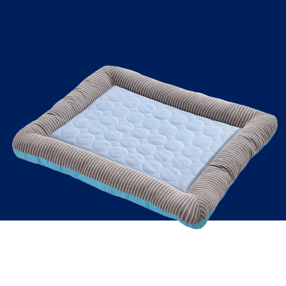 Blue cooling pet mat with light blue dotted surface and striped fabric border.