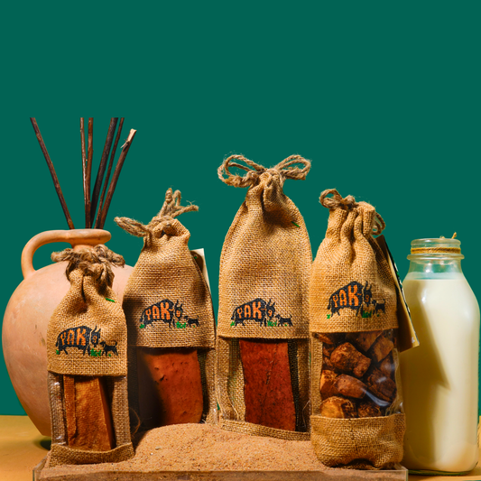 Yak milk cheese chew burlap bags with brown chew sticks and a milk bottle