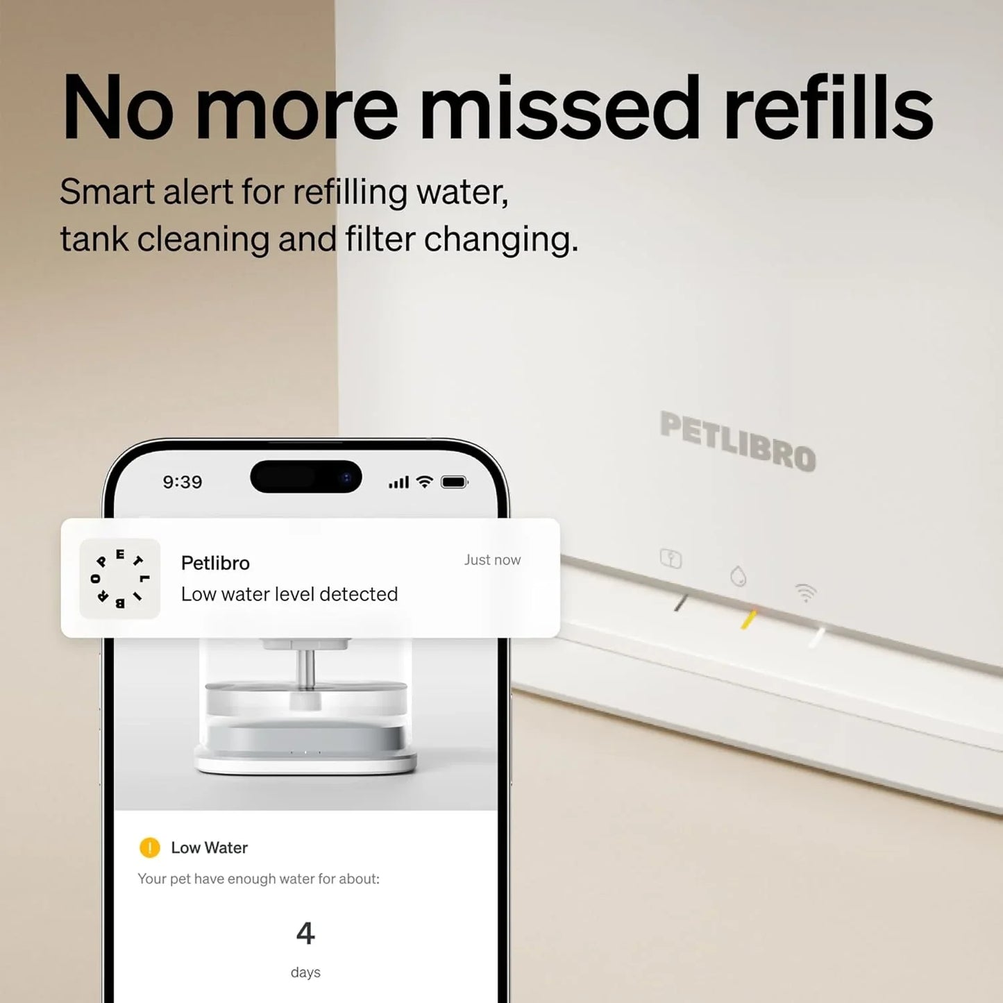 White pet water fountain with smart notification phone screen shown beside it.