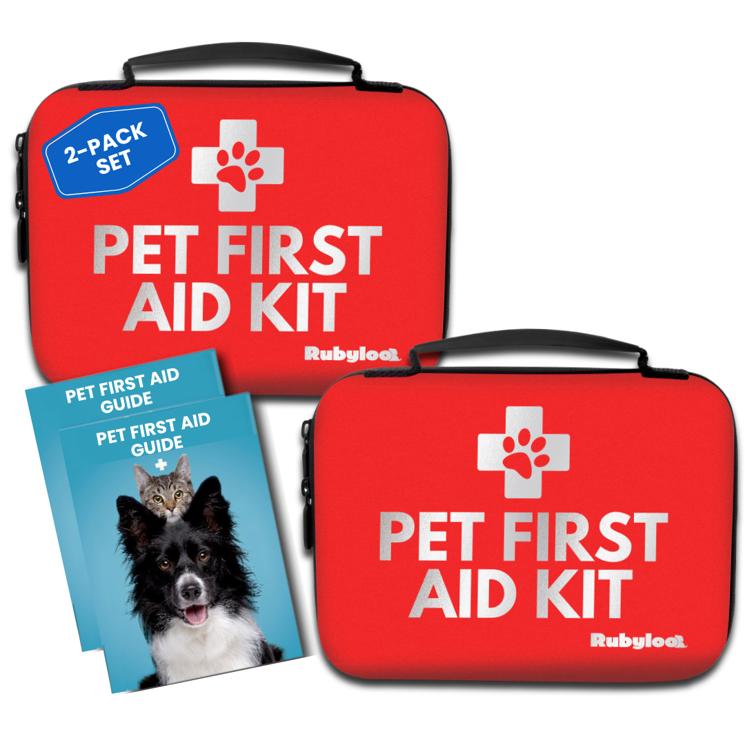 Two red pet first aid kit bags set with paw logo and blue first aid guide