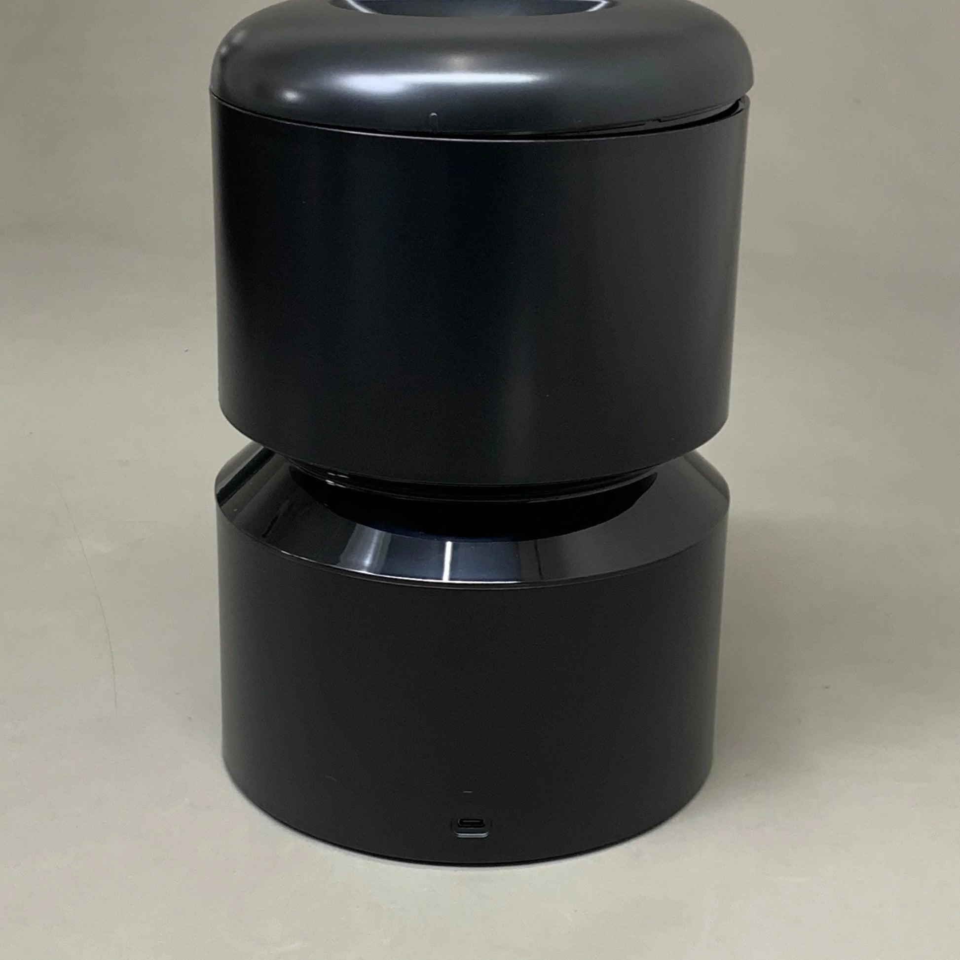 Black automatic cat feeder base with stacked bowl design