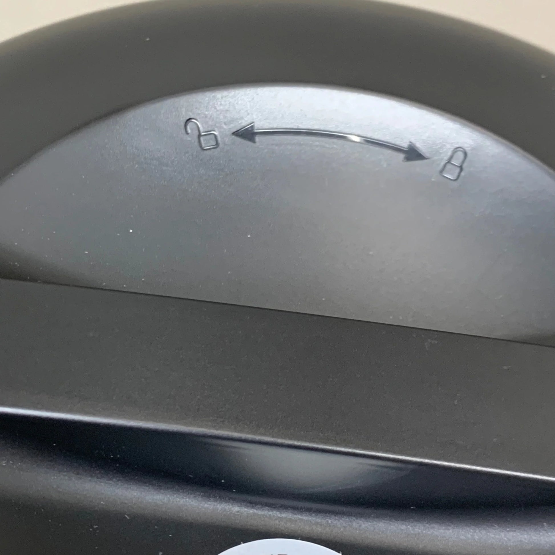 Black feeder top panel with arrow setting marks