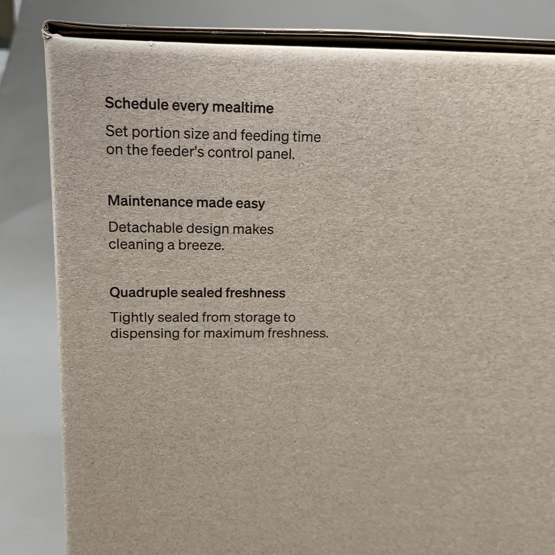 Automatic feeder product box with printed usage and maintenance instructions