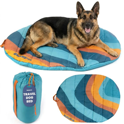 Travel dog bed with blue and orange striped round mat and matching compact carry bag
