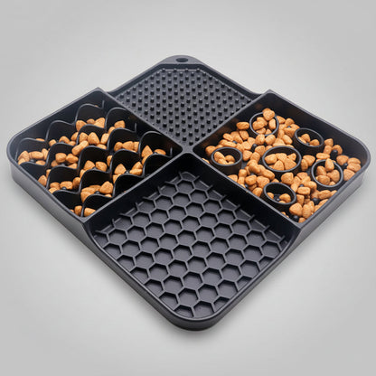 Black silicone slow feeder lick mat with textured dots, honeycomb, and circle pattern