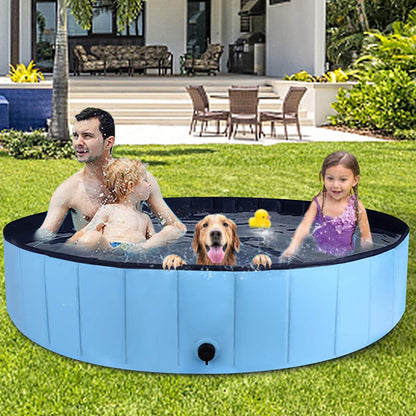 Lake Blue round splash pool with two children and a dog in the water