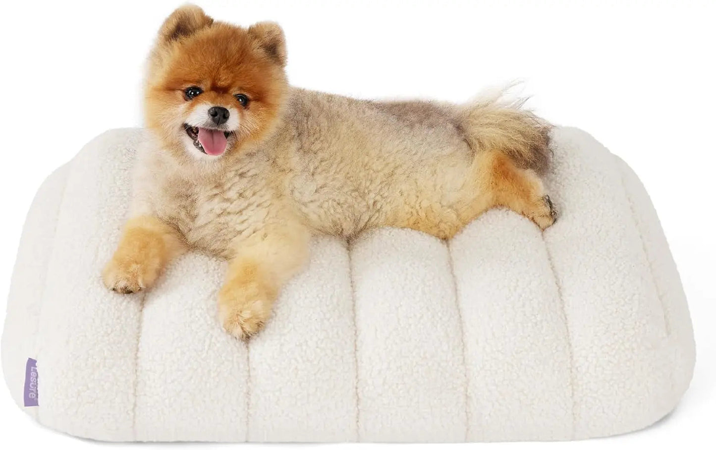 Orthopedic dog bed in light cream plush with a small tan dog resting
