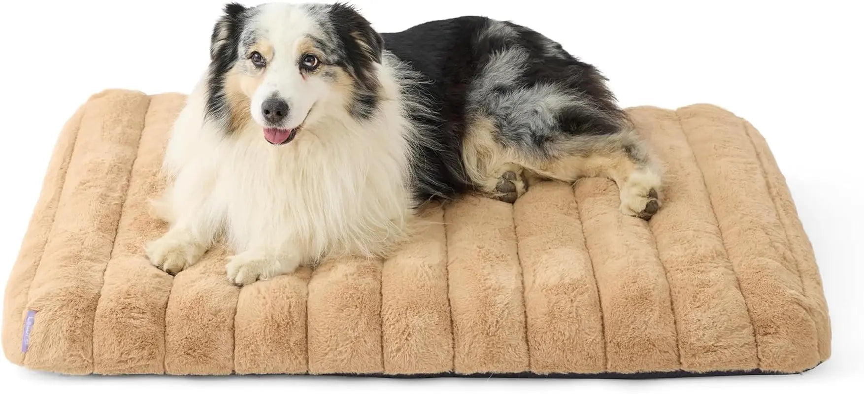 Orthopedic dog bed, tan/beige plush with rounded bolsters and vertical quilt lines