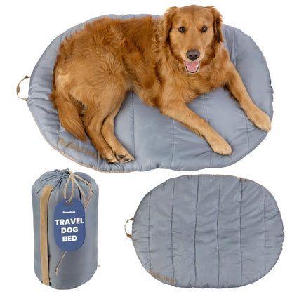Foldable travel dog bed in light gray with plush cushion and matching carry bag