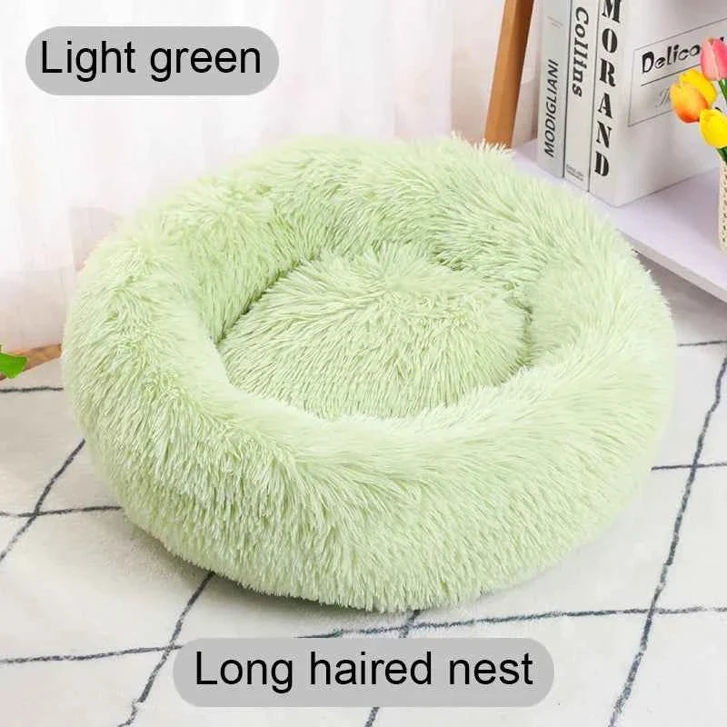 Light green round donut pet bed with long-hair plush shag outer and inner nest