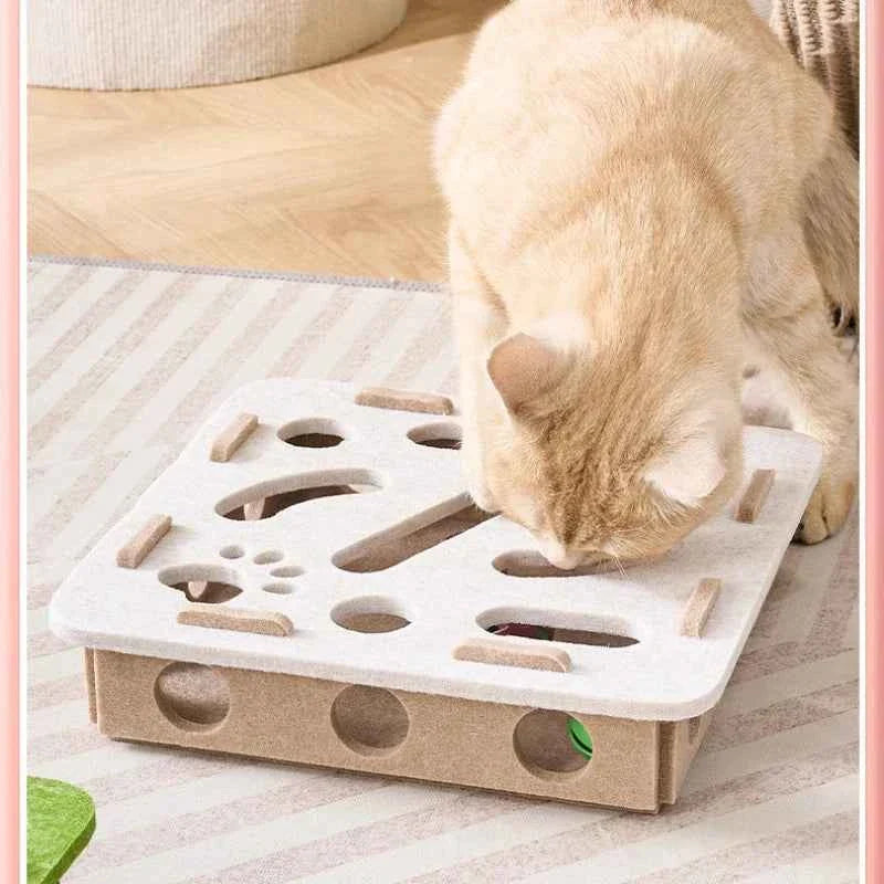 Interactive cat puzzle scratch toy with white felt top, circular cutouts, and wooden pegs