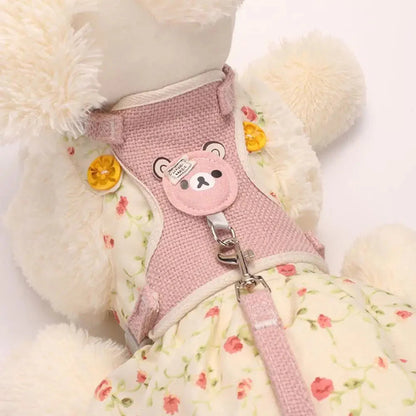Pink pet harness vest with bear patch and metal leash clip, adjustable straps