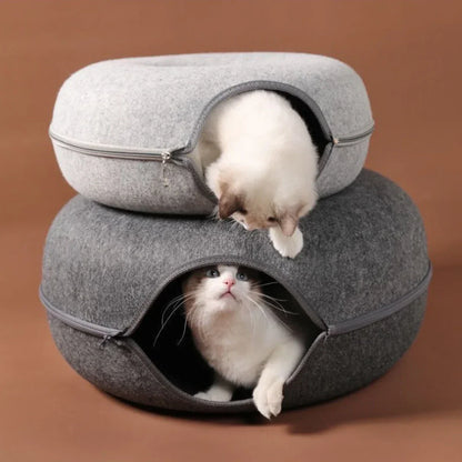 Two cats in cozy felt cat beds, one peeking out and another climbing on top, perfect for pet comfort and play.