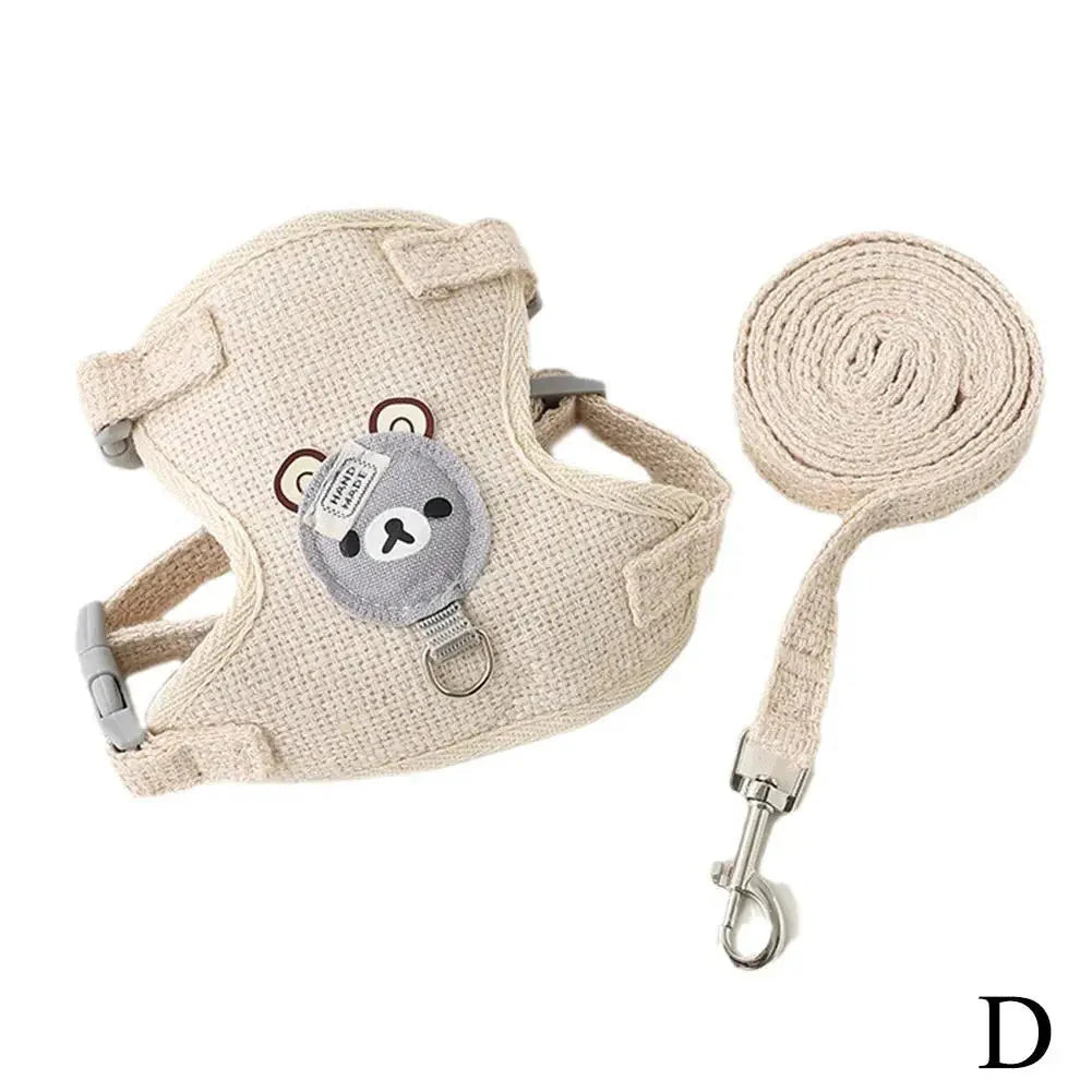Beige pet harness vest with bear patch and adjustable leash, coiled rope