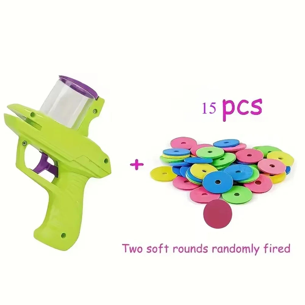 Green and purple disc launcher toy with multicolor soft disc pile