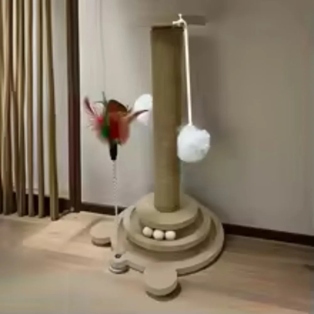 Gray sisal cat scratching post with dangling pom-pom balls and round tiered platform