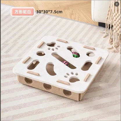 White cat puzzle toy with circular maze cutouts and multicolor peekaboo pieces