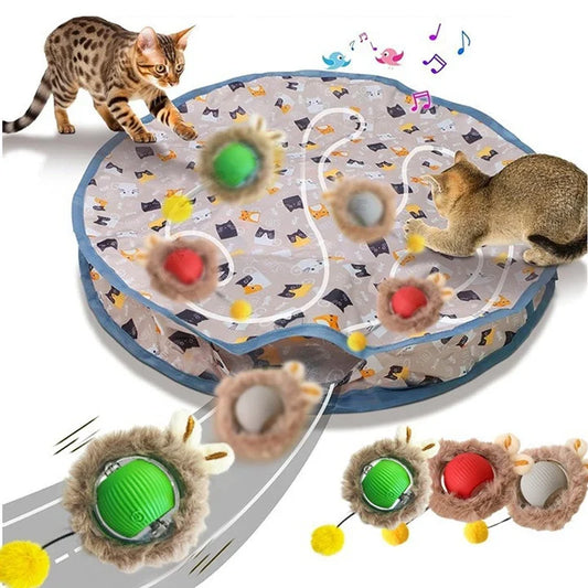 Interactive cat play mat with rolling balls and built-in pouch, shown with indoor cats