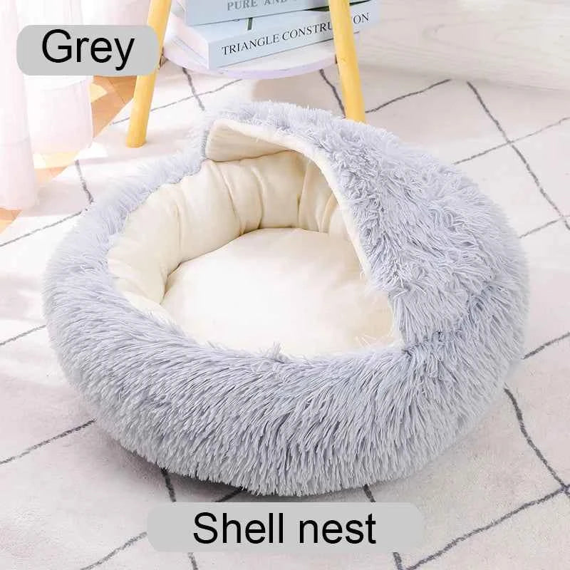 Grey shaggy round pet bed with soft inner cushion and raised donut-style rim