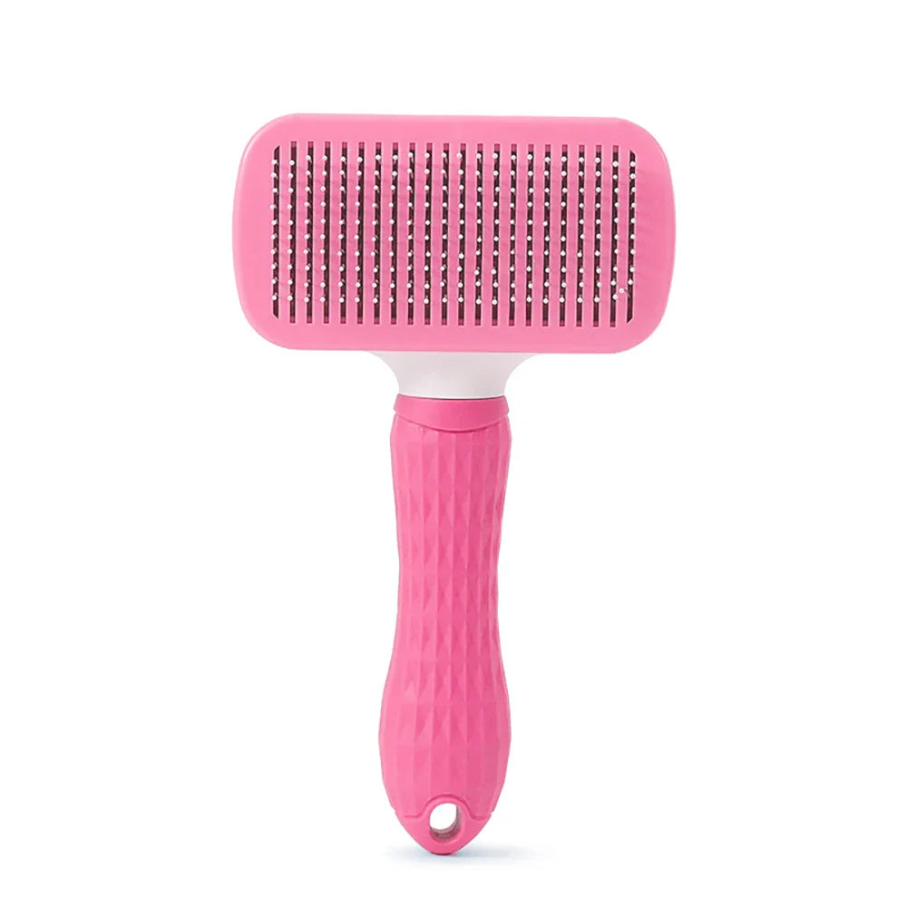 Pink deshedding pet grooming brush with pin bristles and long grip handle