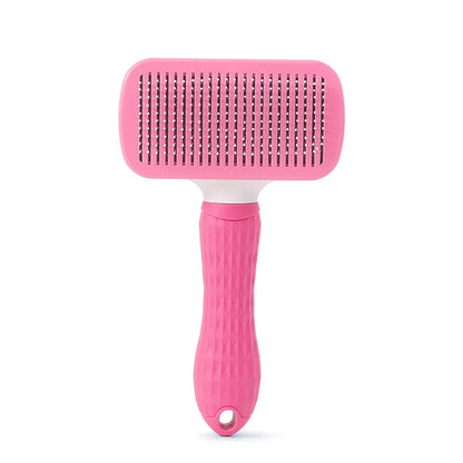Pink deshedding pet grooming brush with pin bristles and long grip handle