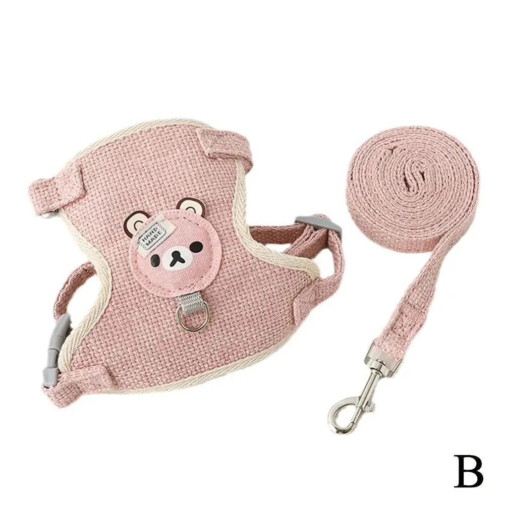 Pink pet harness vest with bear patch and adjustable leash, coiled rope
