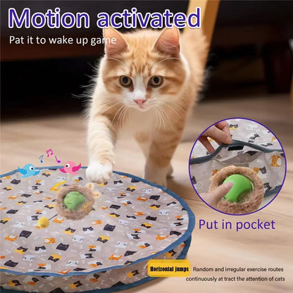 Motion-activated cat play mat with pocket and rolling green ball, cat playing