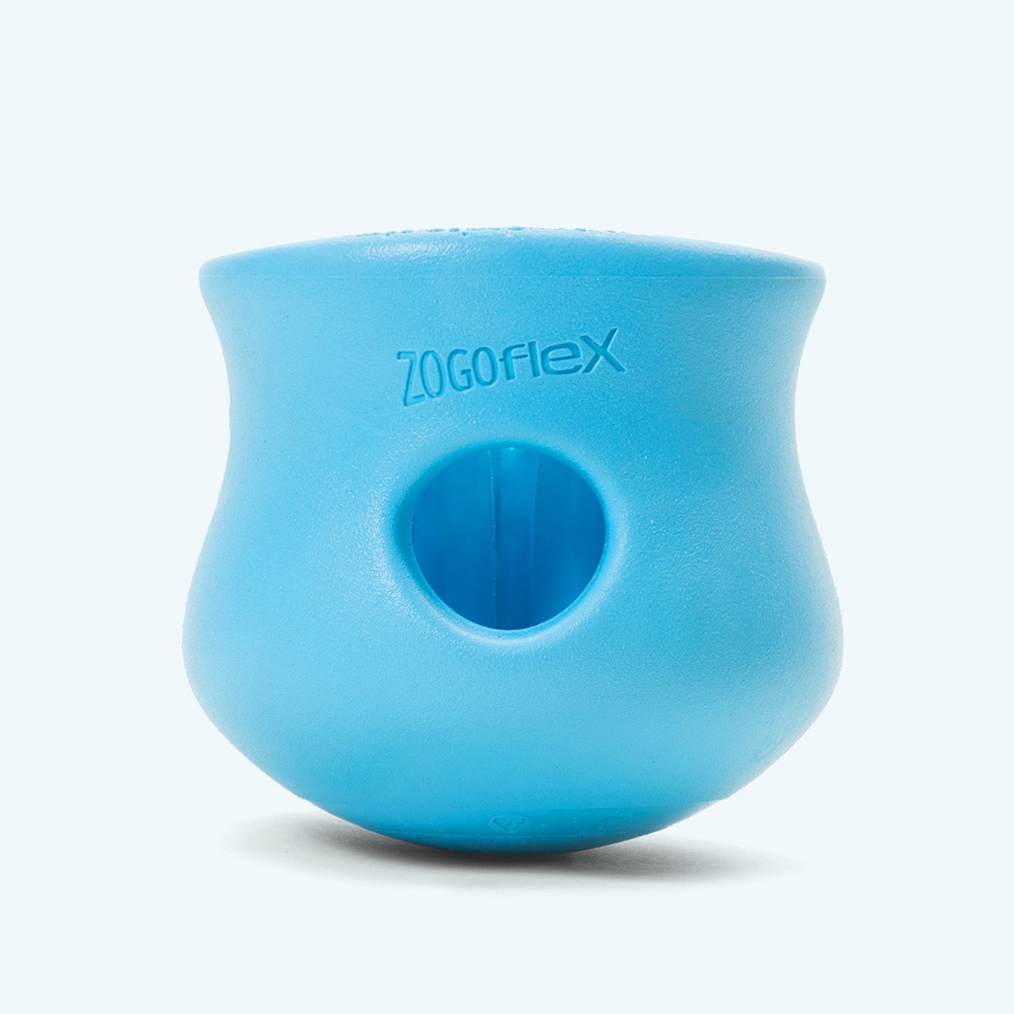 Blue silicone treat dispenser with circular hole opening on the front
