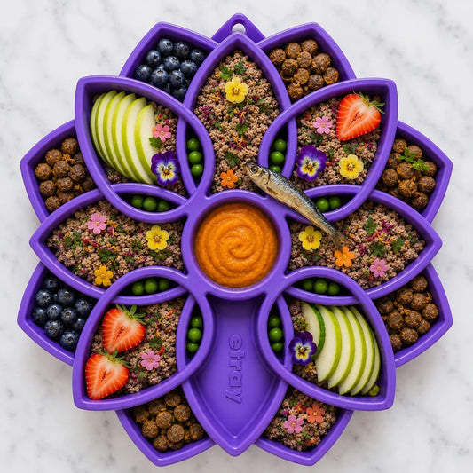 Purple Mandala slow feeder dog bowl filled with kibble, berries, peas, and fruit