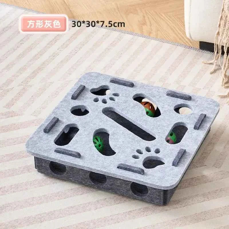 Interactive cat puzzle scratch toy with gray felt top, paw-shaped holes, and wooden pieces