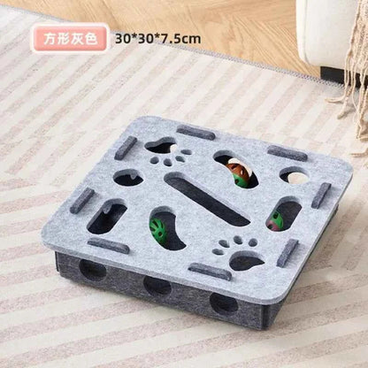 Interactive cat puzzle scratch toy with gray felt top, paw-shaped holes, and wooden pieces