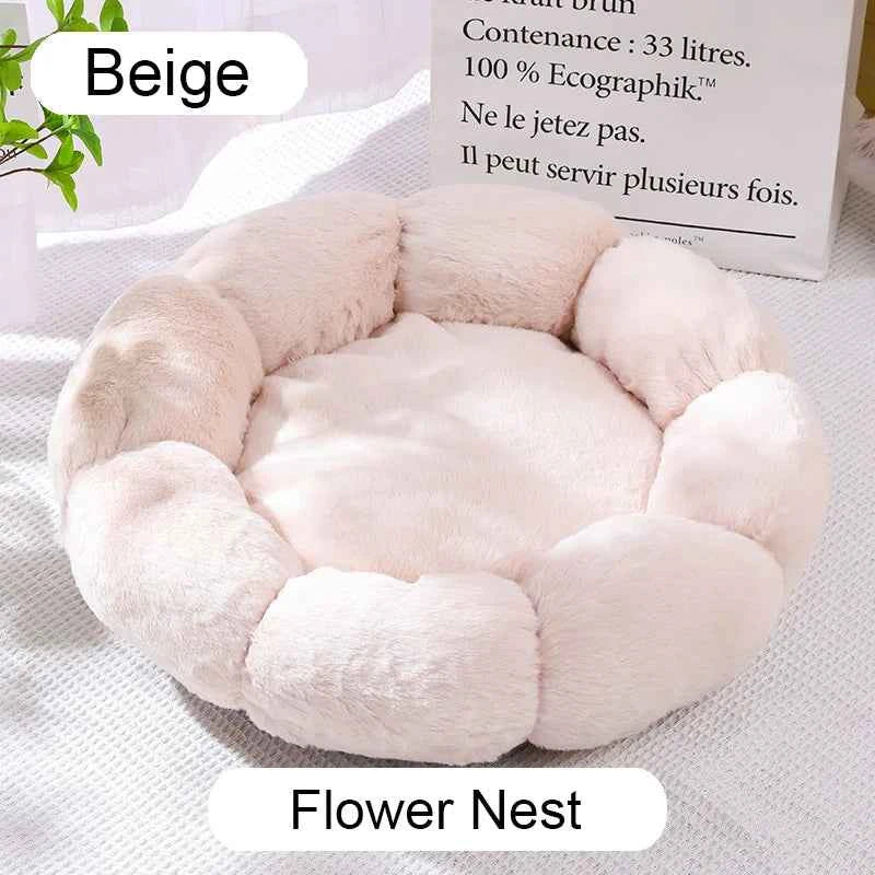 Beige round plush pet bed with cushioned center and raised donut-style edges