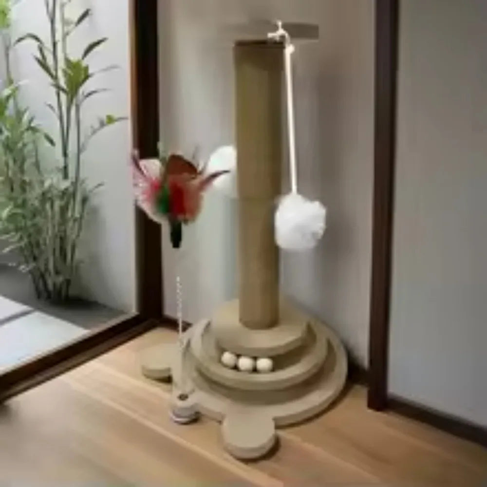 Gray sisal vertical cat scratching post with tiered base and hanging fuzzy ball toys